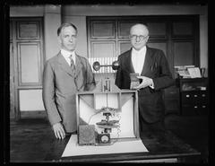 Dr. L.J. Briggs and Dr. Paul R. Heyl with the first experimental earth inductor compass model awarded Magellan Gold Medal