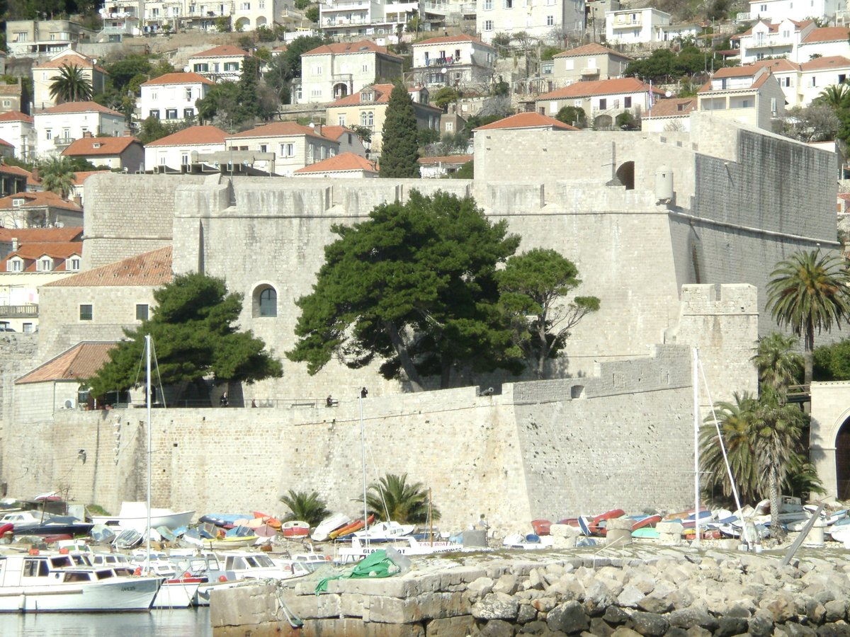 View of Revelin Fortress in Dubrovnik old town with historic stone walls and towers