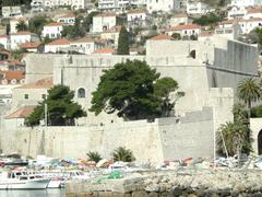 View of Revelin Fortress in Dubrovnik old town with historic stone walls and towers
