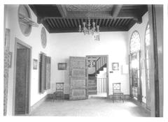 Interior of the American Legation Moorish style pavilion in Tangier with painted doors, ornate ceilings, and mosaic tile floor