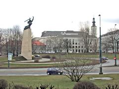 Warsaw Nike monument near W-Z road with rebuilt Jablonowskich Palace in background
