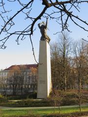 Nike Monument in Warsaw with cloudy sky background