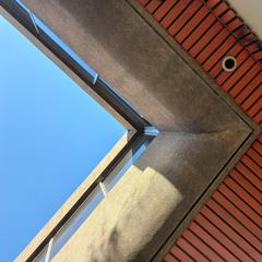 Architectural symmetry at the University of Alcalá entrance on Almirante Barroso street