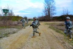 U.S. Army paratroopers from 173rd Airborne Brigade patrolling hilltop at Longare Complex in Vicenza Italy
