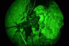 U.S. Army paratrooper from 173rd Airborne Brigade patrolling hilltop during training at Longare Complex, Italy
