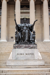 Front view of the Alma Mater statue in 2020 displaying detailed sculptures and architecture