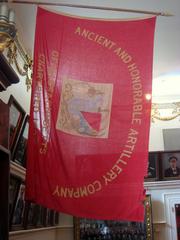 Flag of the Ancient and Honorable Artillery Company of Massachusetts in museum display