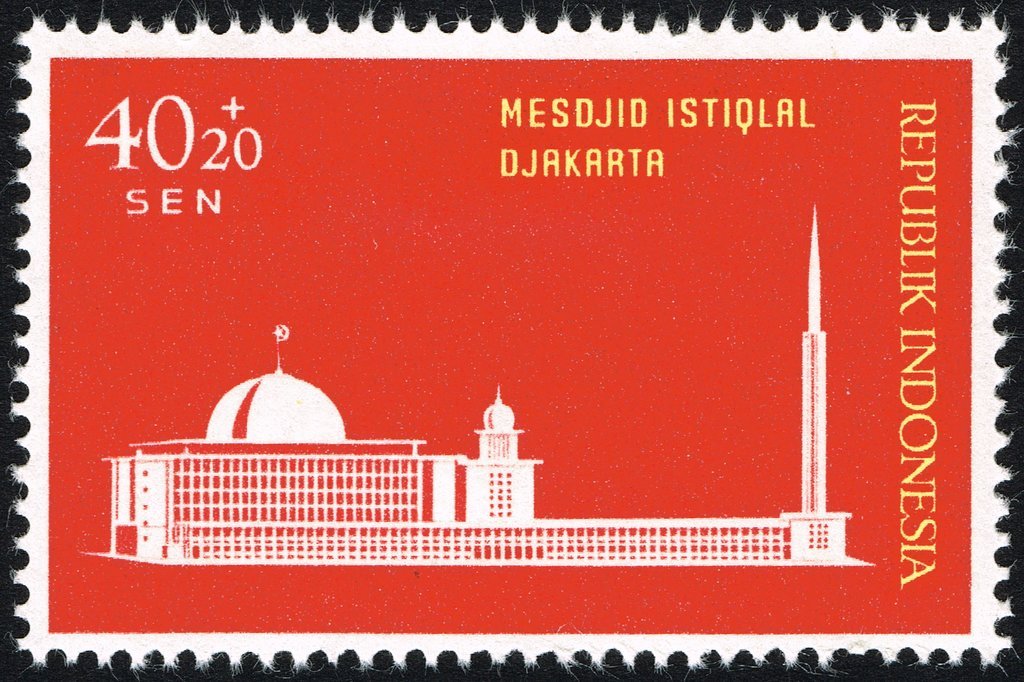Indonesian postage stamp depicting the construction of Istiqlal Mosque in 1962