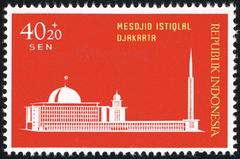 Indonesian postage stamp depicting the construction of Istiqlal Mosque in 1962
