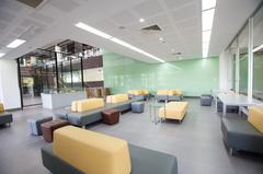 Library building with modern architectural design and day-time lighting