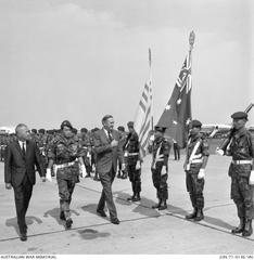 John G. Gorton inspecting Vietnamese Guard of Honour at Tan Son Nhut Airport with South Vietnamese and Australian Defence Ministers