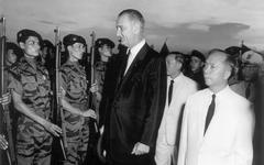Vice President Lyndon B. Johnson reviewing Vietnamese marines at Saigon's Tan Son Nhut Airport with South Vietnamese Vice President Nguyen Ngoc Tho, May 11, 1961