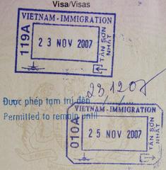 Vietnam immigration stamp on a Malaysian passport page