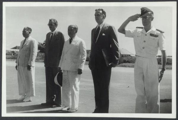 Arrival of Mr. Jessup at Tan Son Nhut Airport Saigon, saluting French and Vietnamese flags