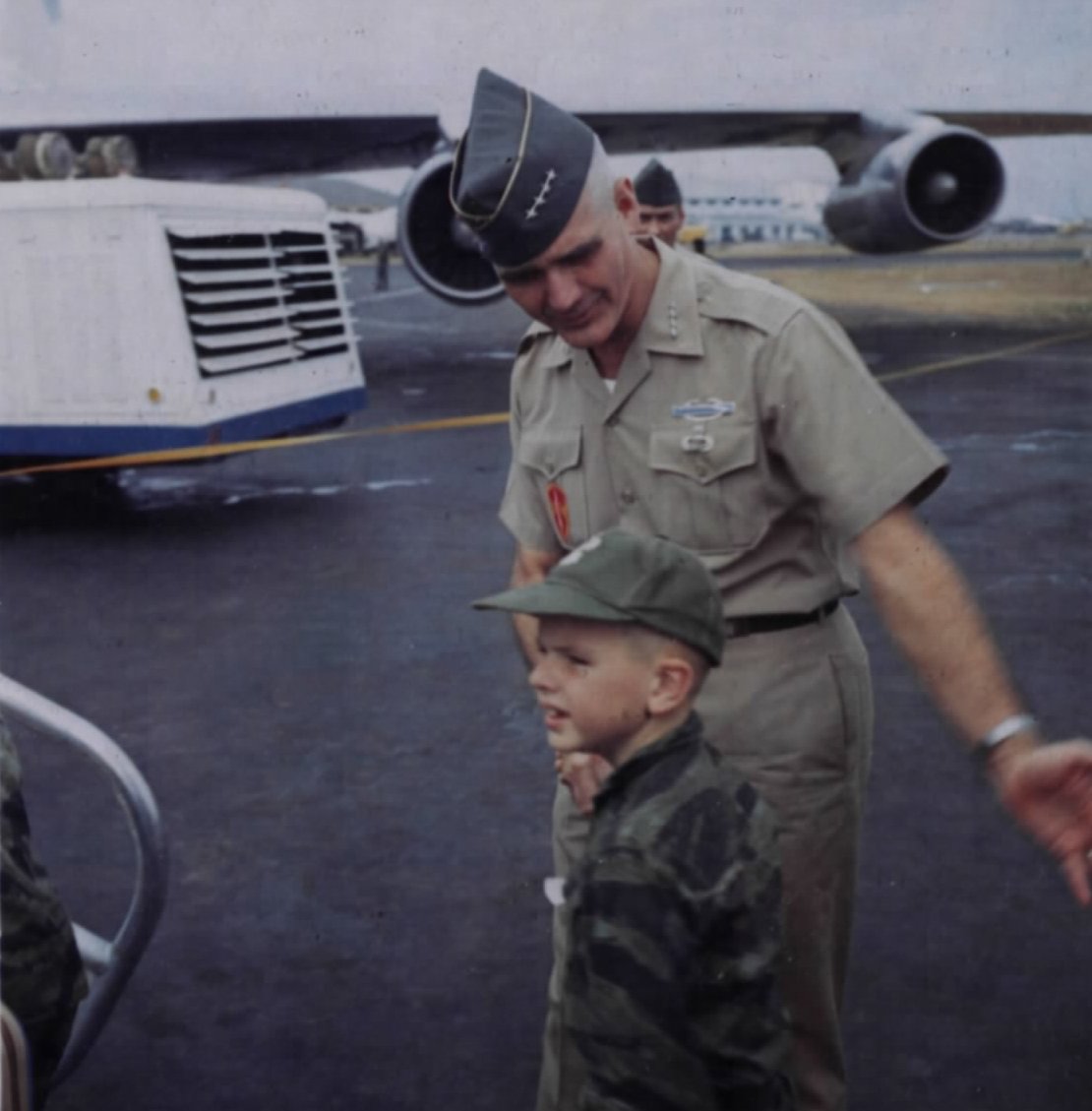 General William Westmoreland bids farewell to a departing dependent boy at Tan Son Nhut Airport