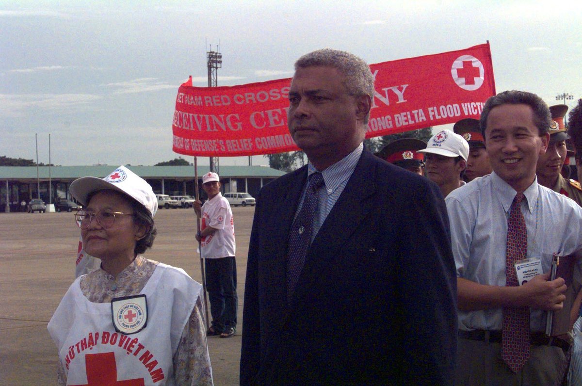 Members of the Viet Nam Red Cross led by Dr. Nguyen Thi Hoi and Mr. Charles A. Ray at Tan Son Nhat, Viet Nam