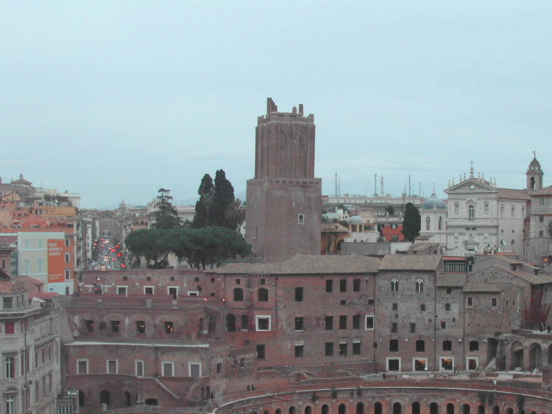 Rome cityscape featuring Torre delle Milizie and Trajan's Market with Via Nazionale and the church of SS. Domenico e Sisto in the background