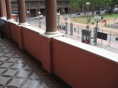 Balcony of the Casa Rosada in Buenos Aires with ornate ironwork and floral decorations