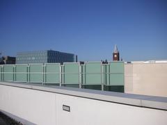 Liverpool Art and Design Academy Terrace with historic buildings and a scenic outdoor seating area