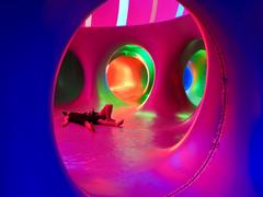 Colorful illuminated inflatable art installation in Melbourne at night