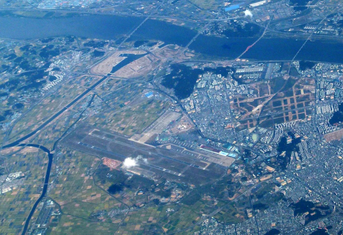 Aerial view of Gimpo International Airport in Seoul with runways and terminal buildings