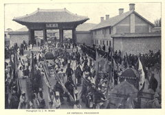 Imperial procession passing through Deahanmun gate of Deoksugung palace in Korea in 1899