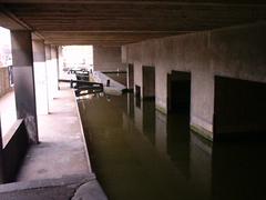 Lock number 10 of Farmer's Bridge flight on Birmingham and Fazeley Canal under BT Tower in Birmingham England