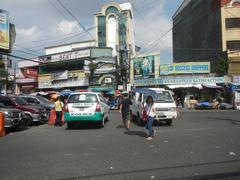 Baclaran Tiangge flea market along Elpidio Quirino Avenue in Parañaque City with busy street scene and people