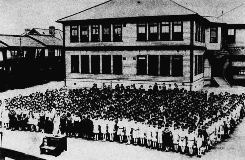 Staff and students together at Baika Women's Specialized School and High School