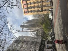 View of Sagrada Familia from an adjacent street on April 15, 2025
