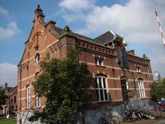 Historic Amsterdam building Regulatuurshuis with Cokeskantoor in the background