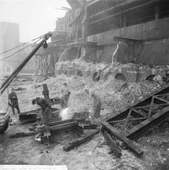 Demolition of distillery in Westergasfabriek at Haarlemmerstraat, Amsterdam, 1961 black and white photo