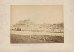 Construction of retorts houses (distilleries) at the Westergasfabriek site of Imperial Continental Gas-Association in Amsterdam with a small train carrying building materials in the foreground