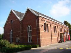 Industrial building in Amsterdam with detailed brickwork and arched windows