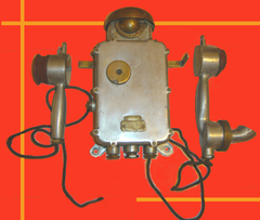 Old Fenya telephone design with rotary dial and handset