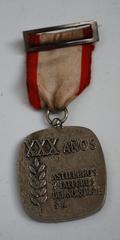 Medal awarded to naval workers for 30 years at Astilleros y Talleres del Noroeste ASTANO in Fene, Ferrol, A Coruña, Galicia, Spain