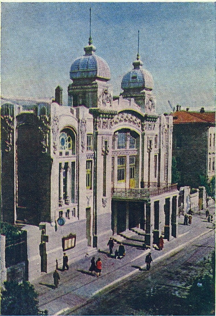Azerbaijan State Academic Opera and Ballet Theatre building with illuminated facade at dusk
