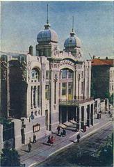 Azerbaijan State Academic Opera and Ballet Theatre building with illuminated facade at dusk