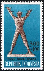 1963 stamp showing construction of West Irian Monument in Indonesia