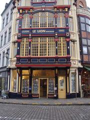 View of the historic Lion Immobilier building in Lille, France