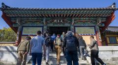 Sailors from USS Emory S. Land visiting Beomeosa Temple in Busan South Korea during MWR Korea hosted tour