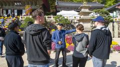 Sailors from USS Emory S. Land visiting Beomeosa Temple in Busan, South Korea during MWR Korea tour on Nov 12, 2024