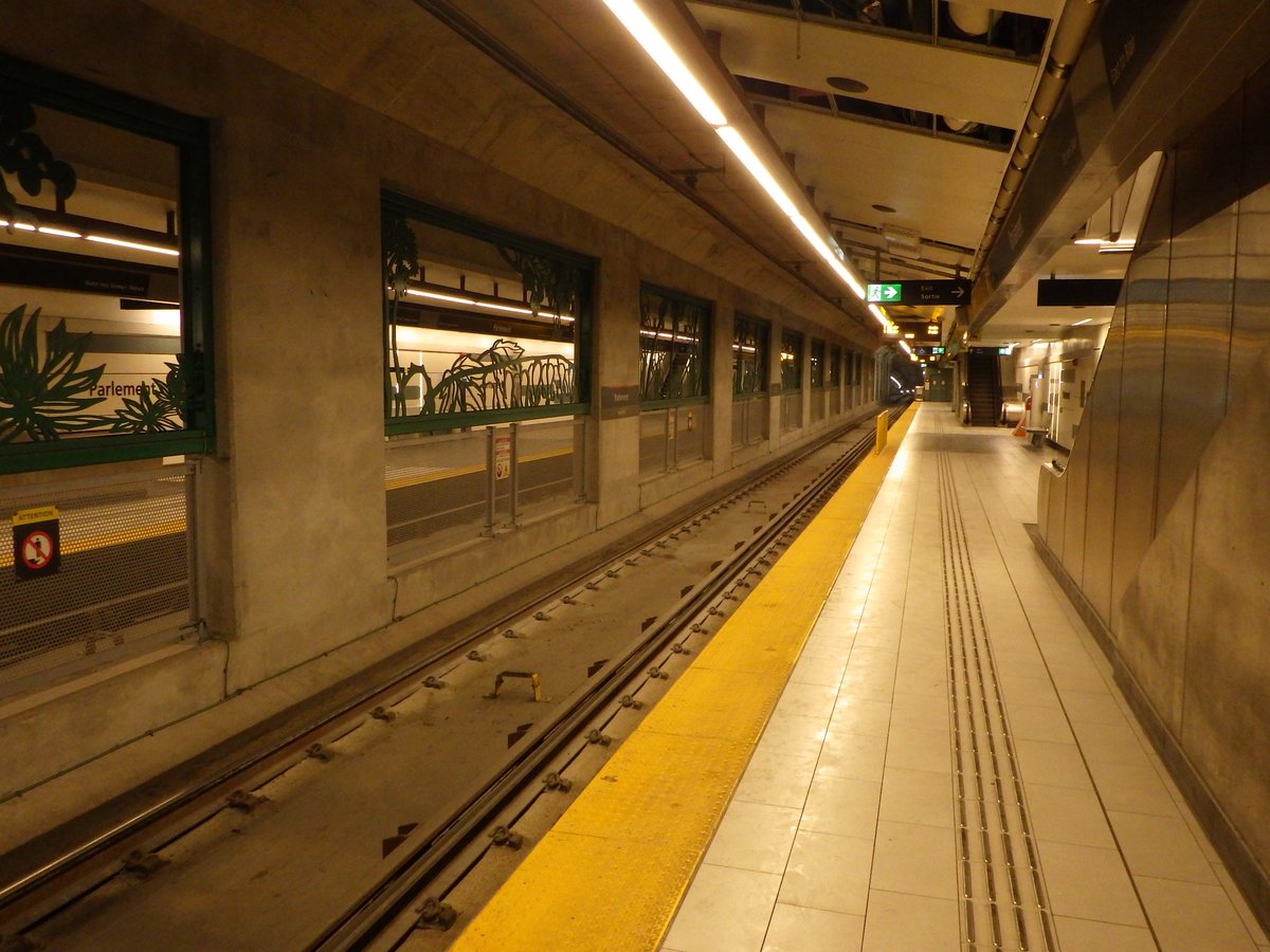 OCTranspo Parliament Station entrance with stairs and glass walls in Ottawa