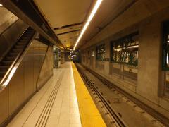 OCTranspo Parliament Station platform with trains and passengers