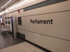 Parliament Station signage with the station name displayed clearly