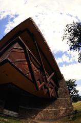 Mission 66 visitor center building surrounded by plants and trees in Rocky Mountain National Park