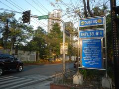 Jupiter Street in Bel-Air Village, Makati City with visible Papa John's Pizza and Burger King stores