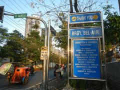 Bel-Air Village junction of Kalayaan Avenue and Makati Avenue in Makati City with commercial buildings and street view