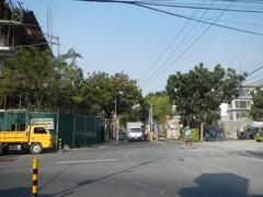 Buendia Flyover and surrounding landmarks in Makati City, Philippines including Forbes Park gates, Buendia MRT Station, SM Cyber Makati Two, and Gil Puyat Avenue