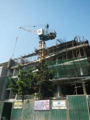 Buendia Flyover over Gil Puyat Avenue in Makati City during daytime with surrounding urban buildings